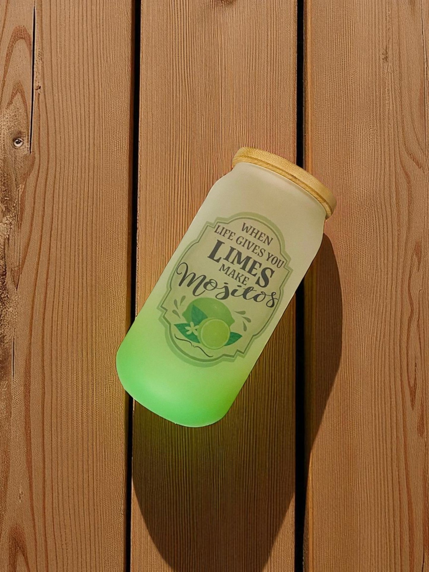 Elegant frosted green mug with straw